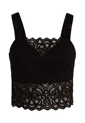 Top court en dentelle noire avec des larges bretelles, mettant en avant des motifs floraux complexes et des bords festonnés à l'ourlet. Design texturé sur l'ensemble.