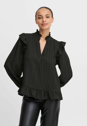 Black long-sleeve blouse with vertical stripes, ruffled neckline and cuffs, and a flared hem. Made from a lightweight textured fabric.