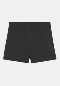 Zwarte sportshorts met een elastische tailleband, gemaakt van glad materiaal. Heeft een eenvoudig ontwerp zonder zichtbare logo's of versieringen.