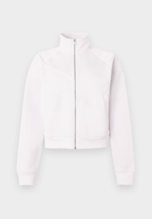 Light pink zip-up jacket with high collar, long sleeves, ribbed cuffs, two side pockets, and subtle diagonal seam details on front.