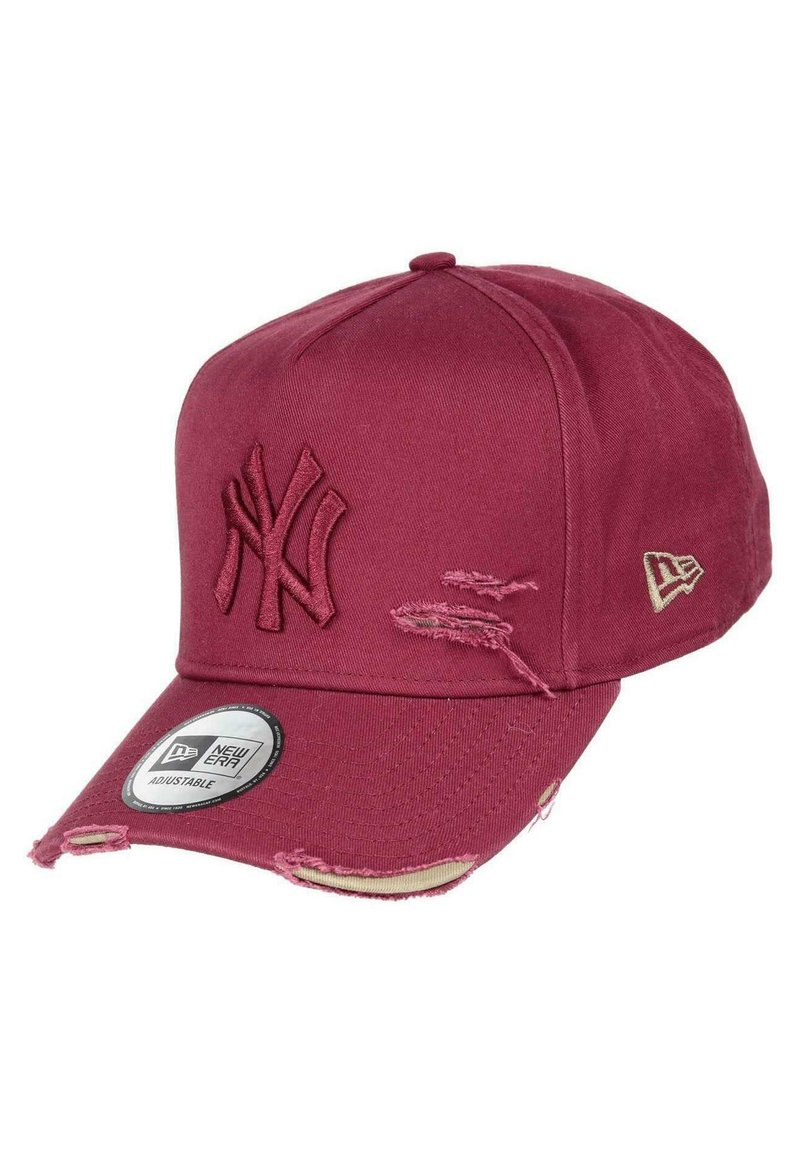 Red cotton baseball cap with embroidered NY logo, distressed detailing on the brim, and an adjustable strap at the back.