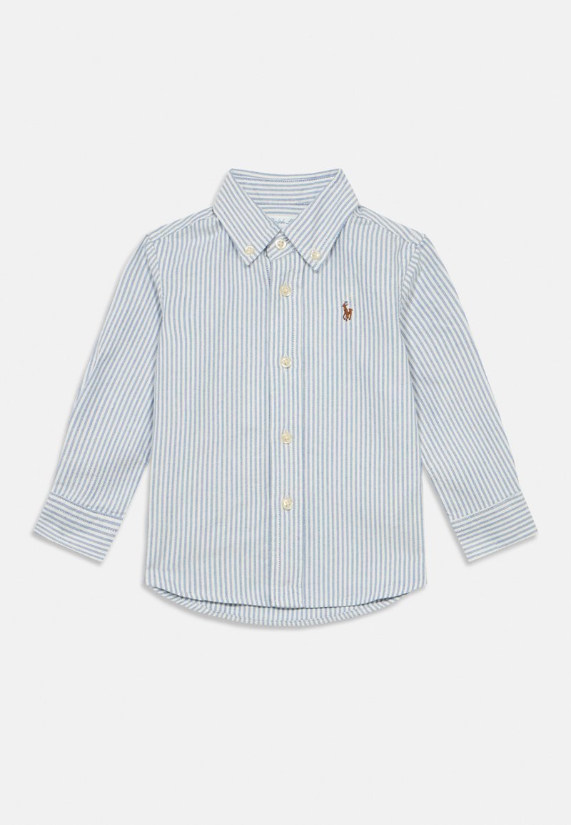 Πουκάμισο με μακριά μανίκια και κάθετες ρίγες σε μπλε και λευκό, με κεντητό καφέ λογότυπο στο αριστερό μέρος του στήθους.