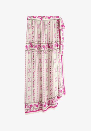 Jupe portefeuille blanche fluide avec des rayures florales verticales roses et vertes et une bordure florale rose, attachée à la taille avec une ceinture assortie.