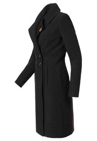 Cappotto da donna nero di lunghezza media, sartoriale, con bavero, bottoni doppi e tasche laterali, mostrato su uno sfondo bianco.