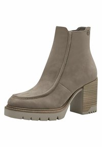 Bottine en cuir grise à talon bloc haut, bout arrondi et semelle plateforme texturée, présentant des coutures minimales et une finition lisse.