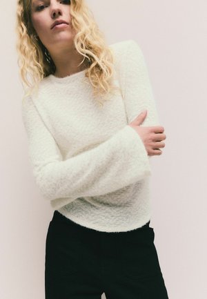 - Sweter