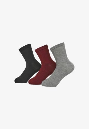 Tre coppie di calze di lana lavorate a maglia in nero, burgundy e grigio. Ogni calza ha un polsino a coste e una texture liscia, adatta per un abbigliamento casual.