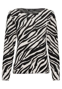Svart och vit zebra-mönstrad tröja i mjukt stickat tyg, med rund halsringning och långa ärmar. Strukturerad design.
