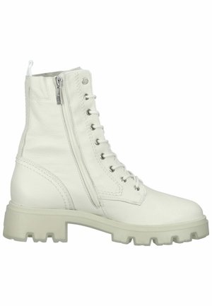 White leather ankle boot with a chunky sole, featuring a front lace closure and a side zipper. Textured upper with visible stitching details.