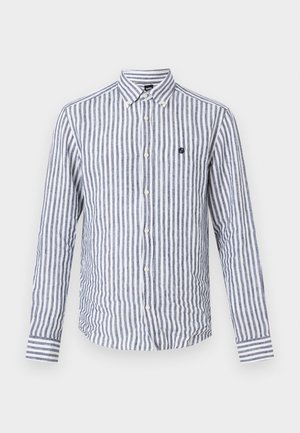 Herreskjorte med lange ermer med vertikale marineblå og hvite striper, knappet ned krage og liten brodert logo på brystet.