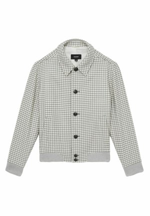 Jachetă gri cu model houndstooth, cu închidere cu nasturi, guler și mansete și tiv cu nervuri. Are nasturi negri și buzunare laterale. Textură moale.