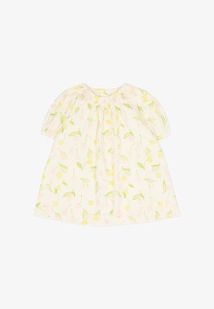 Lichtgewicht jurk met korte pofmouwen, met gele kersen en roze bloesems op een crèmekleurige achtergrond. Detail met een gerimpelde halslijn.