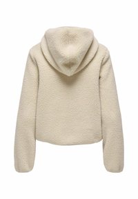 Fleece-hettegenser i off-white med teksturert overflate, kort modell og stor, avrundet hette. Sømløse ermer og ingen synlige festemidler.