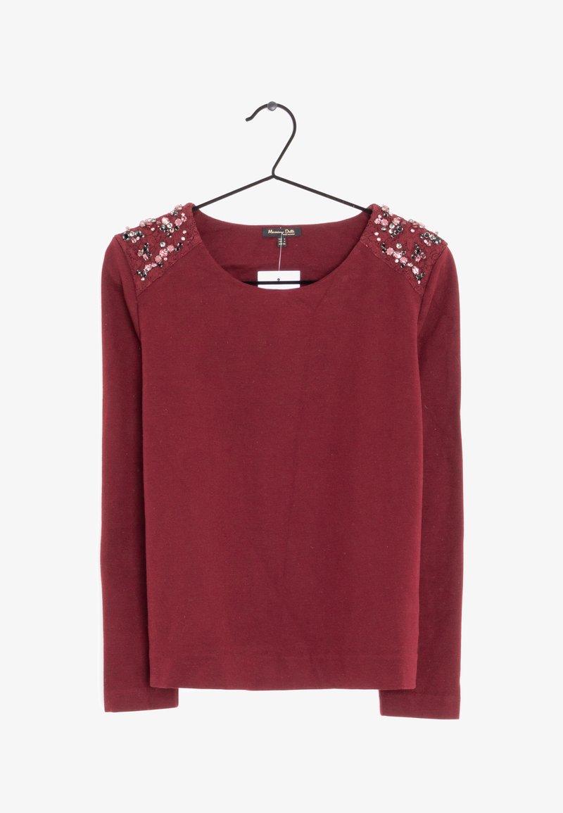 Bordeauxrotes Langarmshirt mit rundem Ausschnitt und mit Juwelen besetzten Schultern. Weicher Stoff mit glatter Textur.