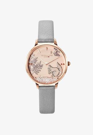 Montre ronde avec un boîtier en or rose, un bracelet en cuir gris et un cadran rose scintillant présentant un écureuil et des motifs floraux.