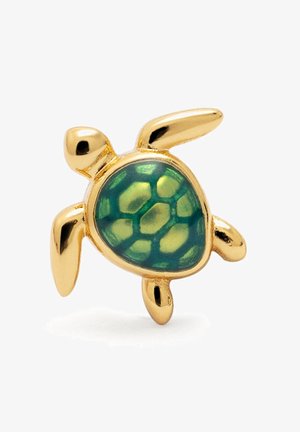 Goldene schmuckstück in Form einer Schildkröte mit einem grünen, strukturierten Panzer, der hexagonale Muster aufweist, und glatten Gliedmaßen, die das Licht reflektieren und für ein glänzendes Finish sorgen.