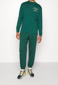 New Balance Långärmad tröja - dark green