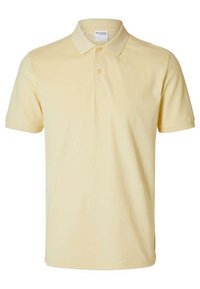 Polo shirt in cotone giallo con colletto classico, patta con tre bottoni e maniche corte. Tessuto liscio e design casual.