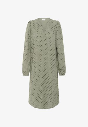 Olivengrünes Kleid mit langen Ärmeln, V-Ausschnitt und schwarzen Punkten. Weicher, strukturierter Stoff mit gerafften Ärmeln und lockerer Passform.