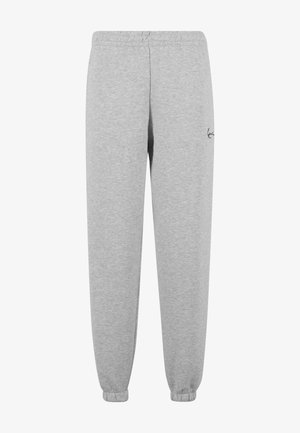 Pantalones de chándal grises hechos de tela suave, con una cintura elástica, piernas ajustadas y un pequeño detalle de logo en el muslo izquierdo.