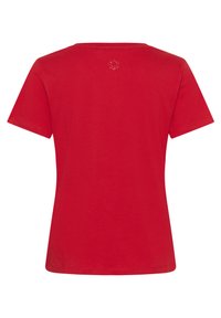 T-shirt aderente rossa a maniche corte con scollo tondo alto e piccolo logo circolare centrato nella parte superiore della schiena.