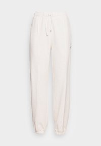 Off-white sweatshirtbyxor med elastisk midja och ärmslut, dragsko fram och liten logotyp patch på övre vänstra lårfickan.