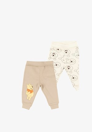 Due paia di leggings per bambini, uno beige con grafica di Winnie the Pooh, uno bianco con motivo ripetuto di facce di orso.