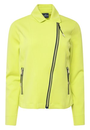 Lys gul jakke med skræddersyet krave, asymmetrisk frontlynlås og to sidelommer med lynlås i kontrasterende mørkeblå farve. Blødt, glat stof.