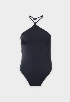 Maillot de bain une pièce noir avec bretelle halter croisée à l'avant et fermeture par agrafe à l'arrière, affiché sur fond uni.