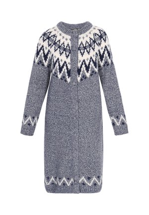 Tumedast sinisest õhkkardiganist, millel on valge mustriga yoke ja sakilised aktsendid. Omab pikaid varrukaid, ümarat kaela ning esist lukku.