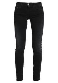 Svarta smala jeans i denim med en slät yta, med knappstängning och framfickor. Slitage i detaljerna pålåren.