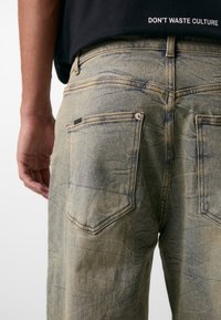 Don't Waste Culture REJA UNISEX - Laisvi džinsai - stone wash