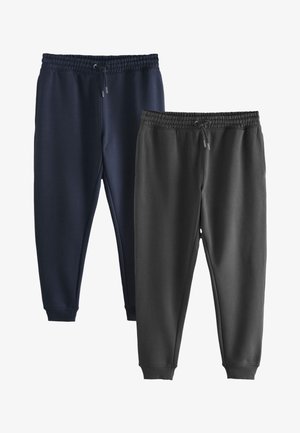 Due paia di pantaloni della tuta con polsini, fascia elastica in vita e coulisse, uno blu scuro e uno nero, affiancati su sfondo bianco.