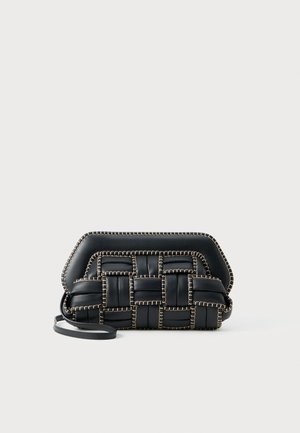 Black woven leather clutch bag with a structured shape, featuring gold stitching along the edges and a detachable shoulder strap.