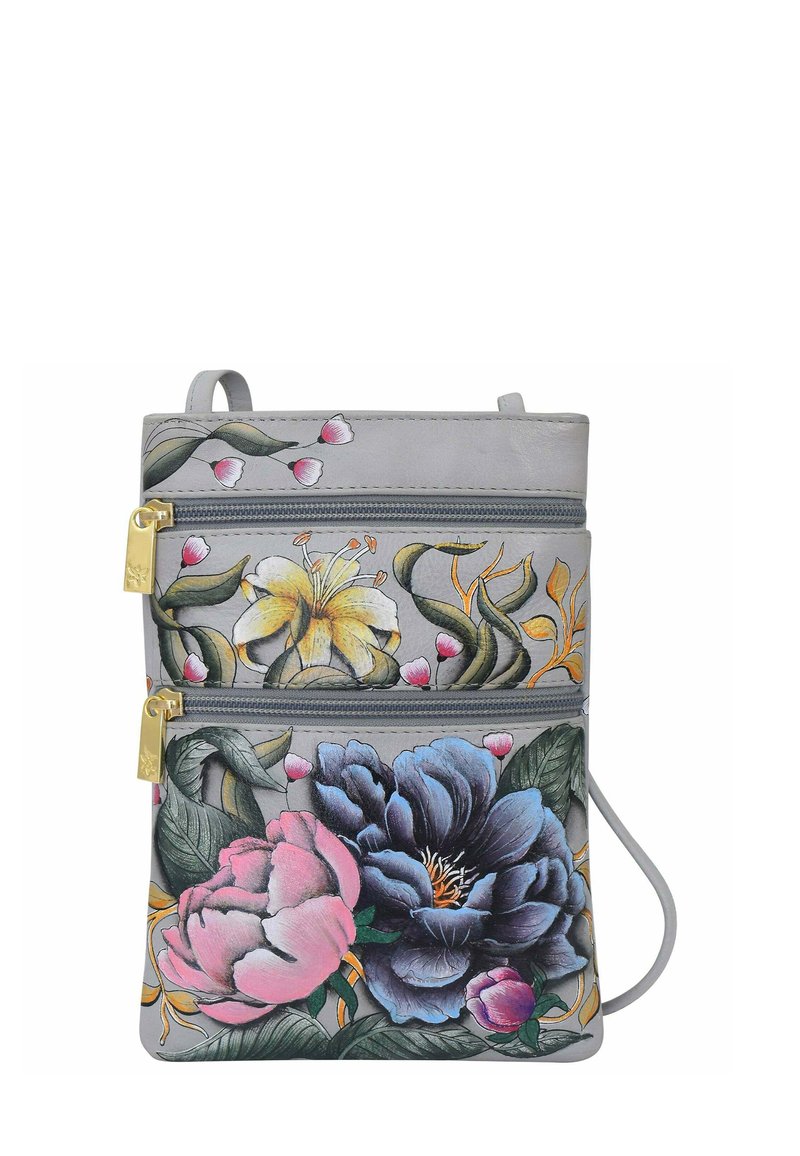 Grijze leren tas met bloemendessins in roze, blauw en geel. Twee met rits afgesloten vakken met gouden hardware accenten.