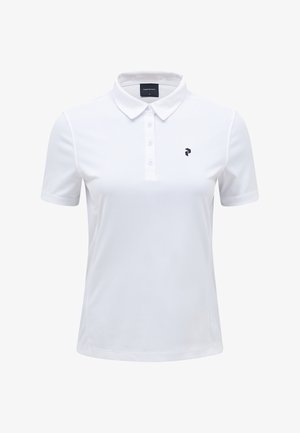 Polo blanc en tissu lisse et léger. Dispose d'un col classique, d'une patte de boutonnage et d'un petit logo noir sur la poitrine.