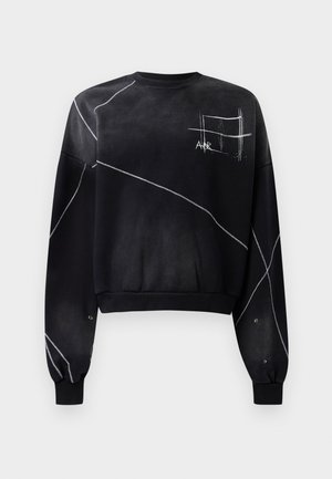 Black cropped sweatshirt with long sleeves, featuring white stitching and a graphic design on the front. Soft fabric, minimalistic style.