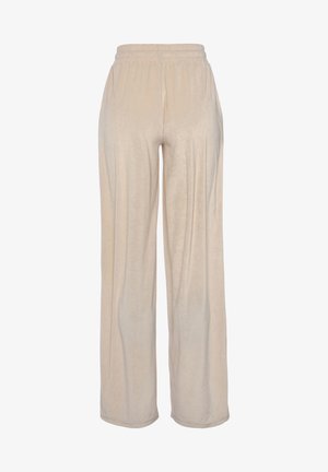 Beige wijde pijpen broek van zacht, textuurstof. Kenmerkt een elastische tailleband en een relaxte pasvorm, met naadloze zoom voor een gladde afwerking.