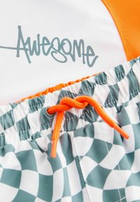 Next SUNSAFE SET - REGULAR FIT - Jogginghose - orange checkerboard