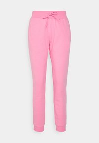 Pantalones de chándal rosas hechos de tela suave, con una cinturilla elástica y cordón, bolsillos laterales y puños ajustados.