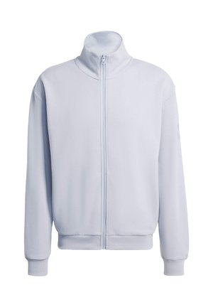 Lichtblauwe jas met rits, hoge kraag, lange mouwen, geribbelde manchetten en een gladde stofstructuur. Voorzien van een centrale ritssluiting.