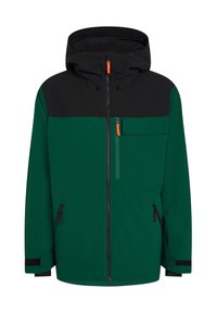 Veste à capuche verte et noire avec fermeture éclair frontale, poches latérales zippées, poche poitrine à rabat et tirettes orange.