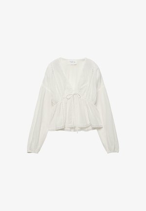 Weiße Bluse mit langen Ärmeln und V-Ausschnitt, tailliert mit einem vorne gebundenen Kordelzug und zarten Spitzenbesätzen.