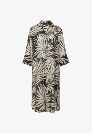 Sukienka z krótkim rękawem, zapinana na guziki, wykonana z lekkiego materiału. Posiada czarno-biały wzór liści, luźny krój oraz długość sięgającą za kolana.