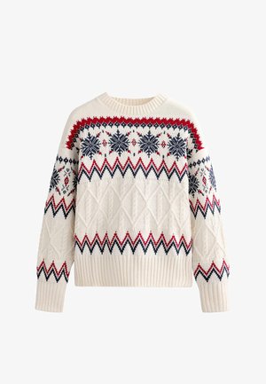 Chunky cream knit sweater features red and navy geometric patterns, snowflakes, and ribbed cuffs and hem. Heavyweight texture and relaxed fit.