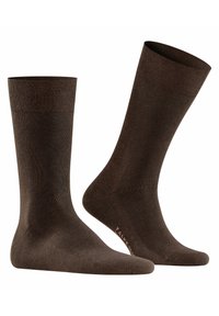 Brązowe skarpetki wykonane z gładkiego materiału, z prążkowanym ściągaczem, w długości do połowy łydki i z wzmocnionym palcem dla większej trwałości.