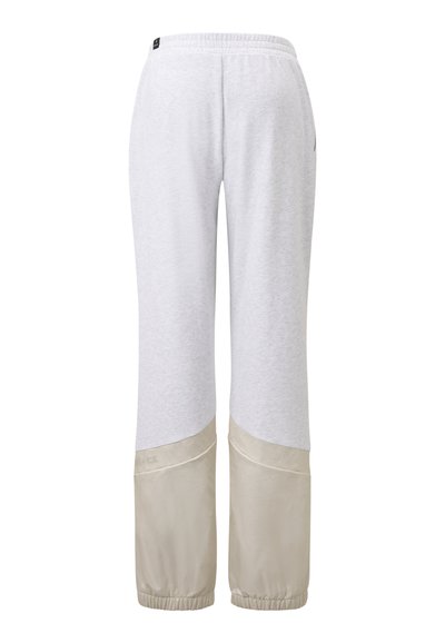 Lichtgrijze sweatpants met een beige onderpaneel en elastische boorden, met een zachte textuur en een logo op de tailleband.
