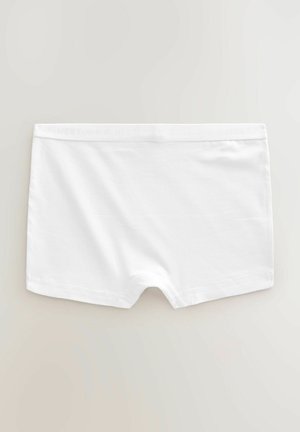 Vita bomullboxershort med mjuk textur, med en subtil elastisk midjeband prytt med "NEXT". Inga ytterligare mönster eller accenter.