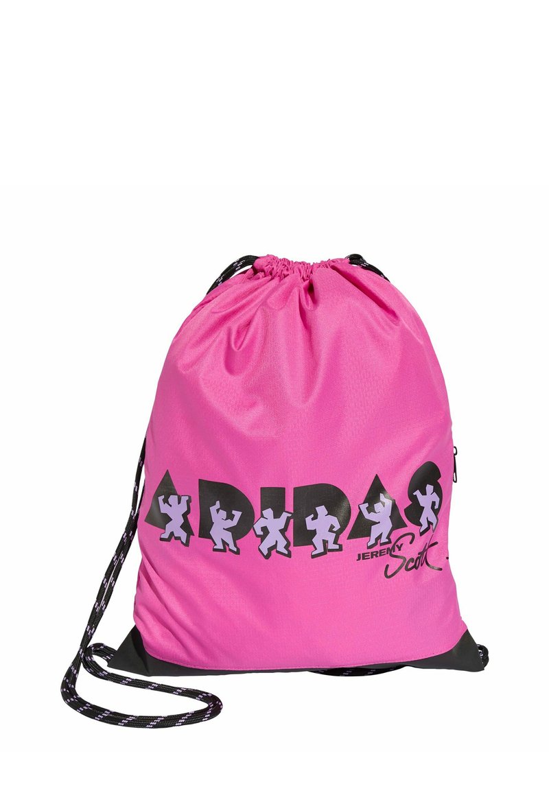 Pink drawstring bag with black accents, logo, and cartoon figures. Made of lightweight material with a smooth texture and adjustable straps.