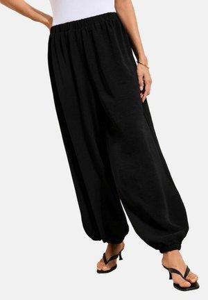 - Spodnie treningowe